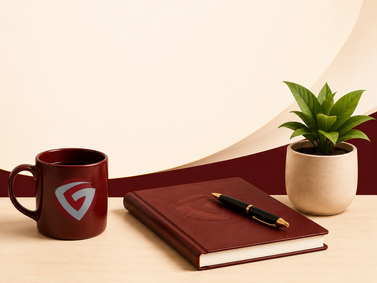 FinanceSuccess branded desk with notebook, pen and coffee cup